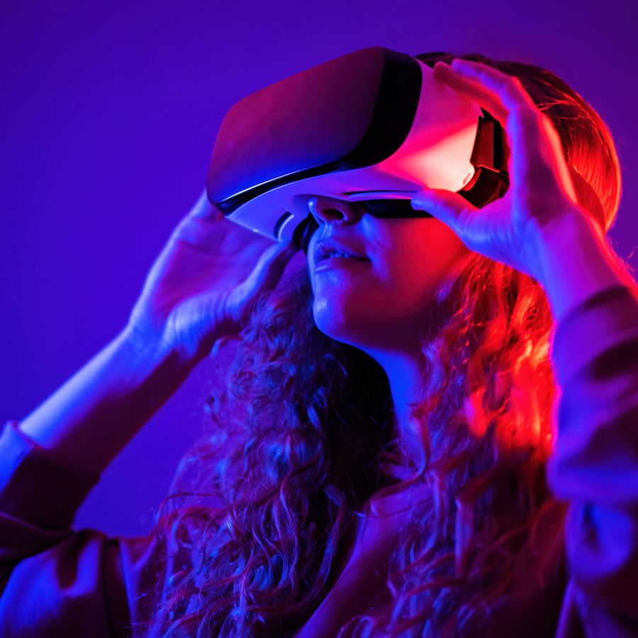 Person with Virtual Reality goggles on.