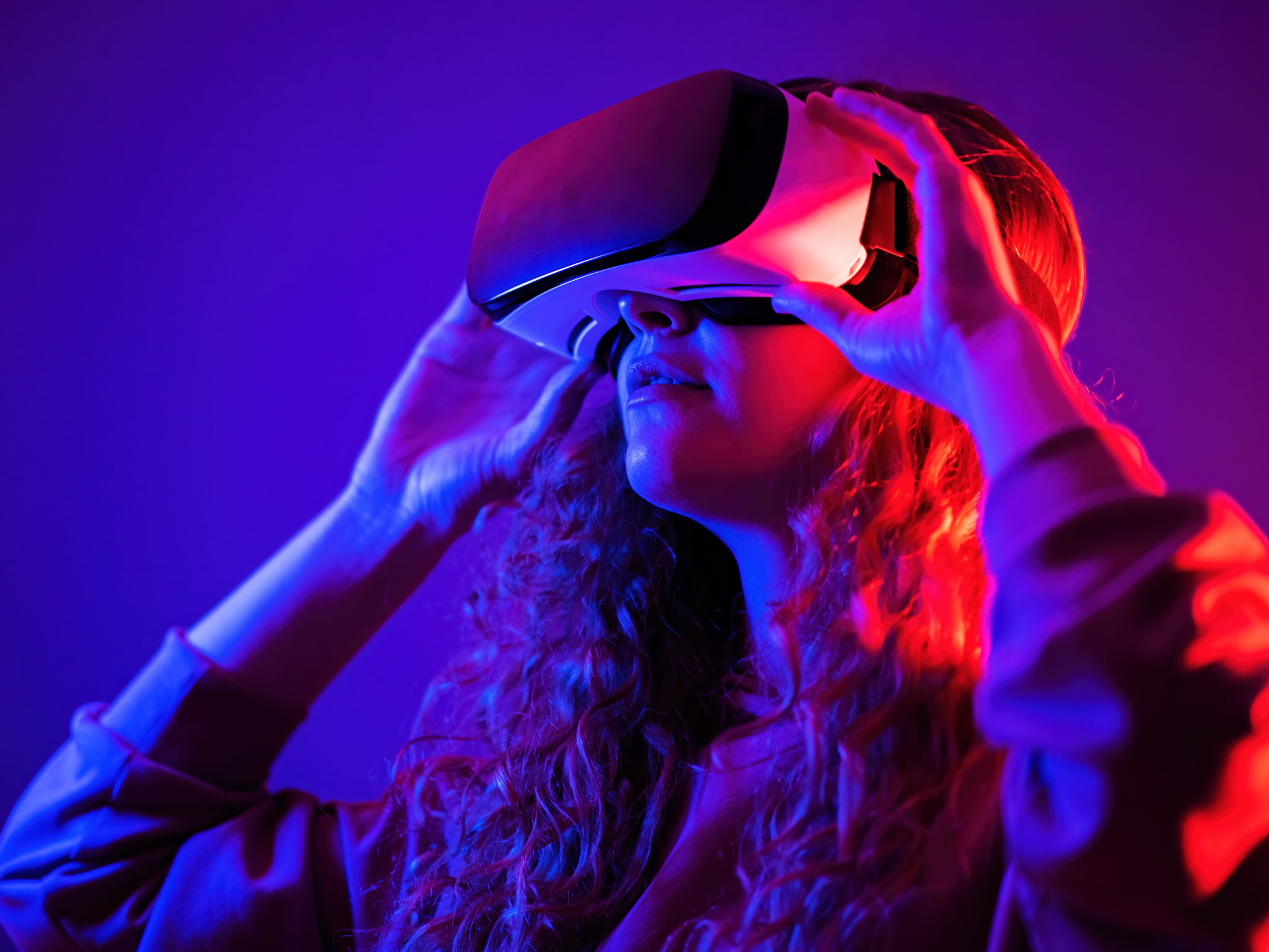 Person with Virtual Reality goggles on.