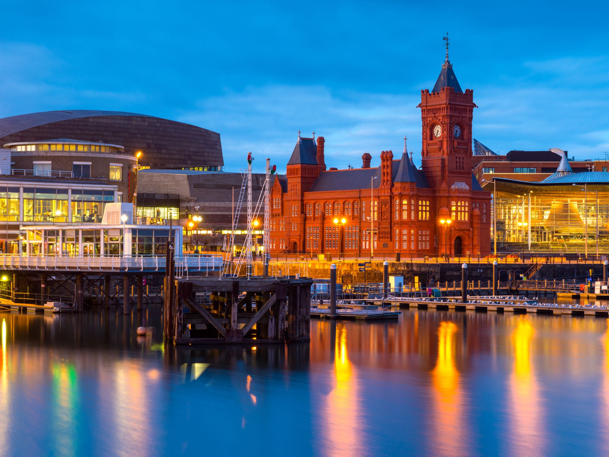 Photo of Cardiff Bay showing the Pierhead Building and Senedd Building.